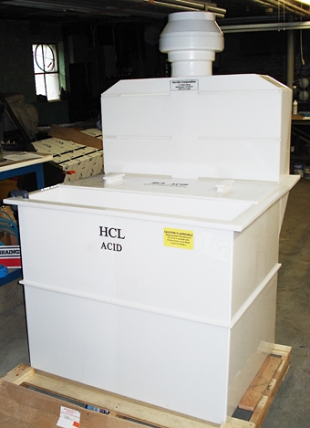 Front view of Polypropylene Hydrochloric Acid Tank with attached front rinse tank, hood, and exhaust blower. Front view of Polypropylene Hydrochloric Acid Tank with attached front rinse tank, hood, and exhaust blower.